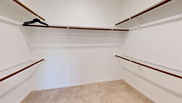 a view of small space with racks on the wall