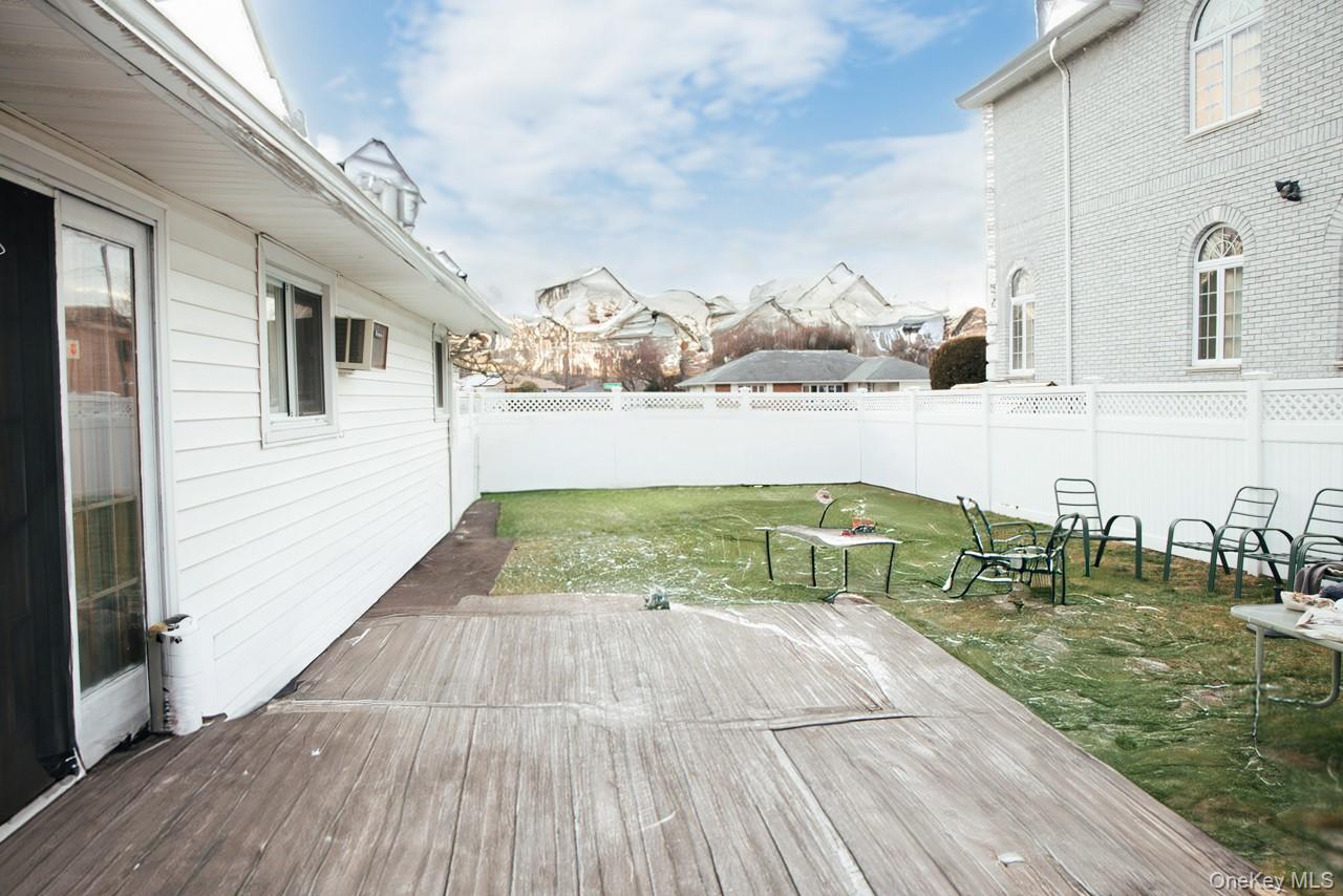1322 Barry Drive South Valley Stream, NY 11580 - Photo 2 of 12 a view of swimming pool with a yard