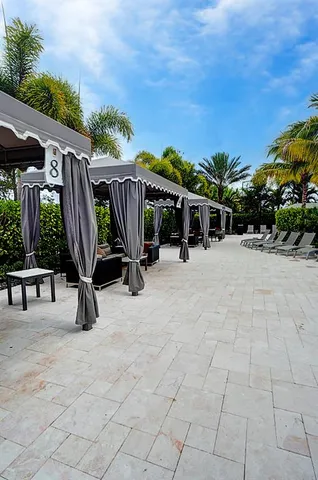a view of swimming pool with chairs
