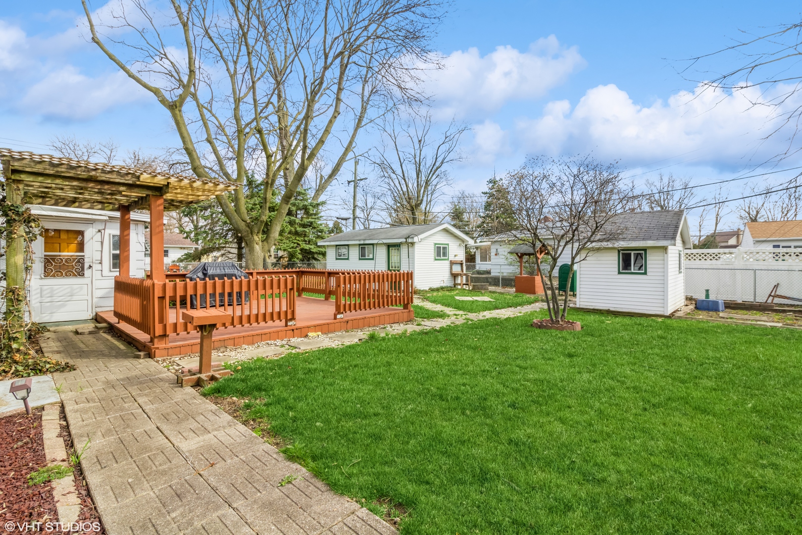 805 Cypress Lane Joliet, IL 60435 - Photo 9 of 10 a view of a house with a yard and deck