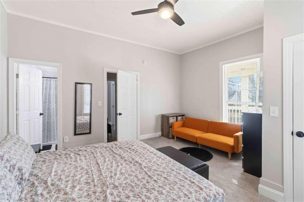 949 East Solomon Street Griffin, GA 30223 - Photo 19 of 26 a bedroom with a bed and a window