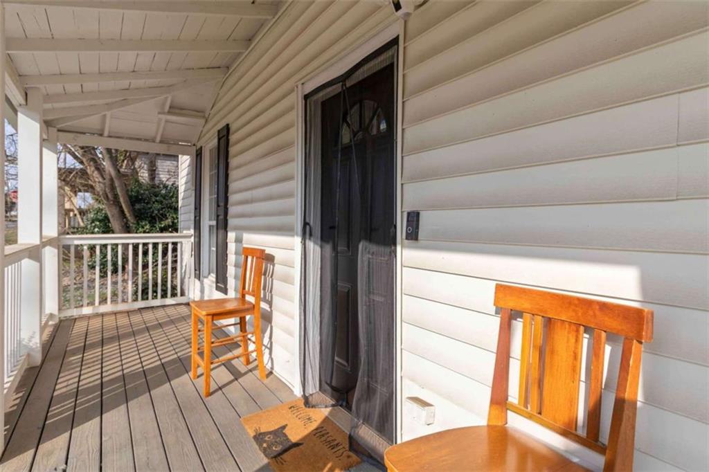 949 East Solomon Street Griffin, GA 30223 - Photo 3 of 26 a view of a two chairs in the balcony