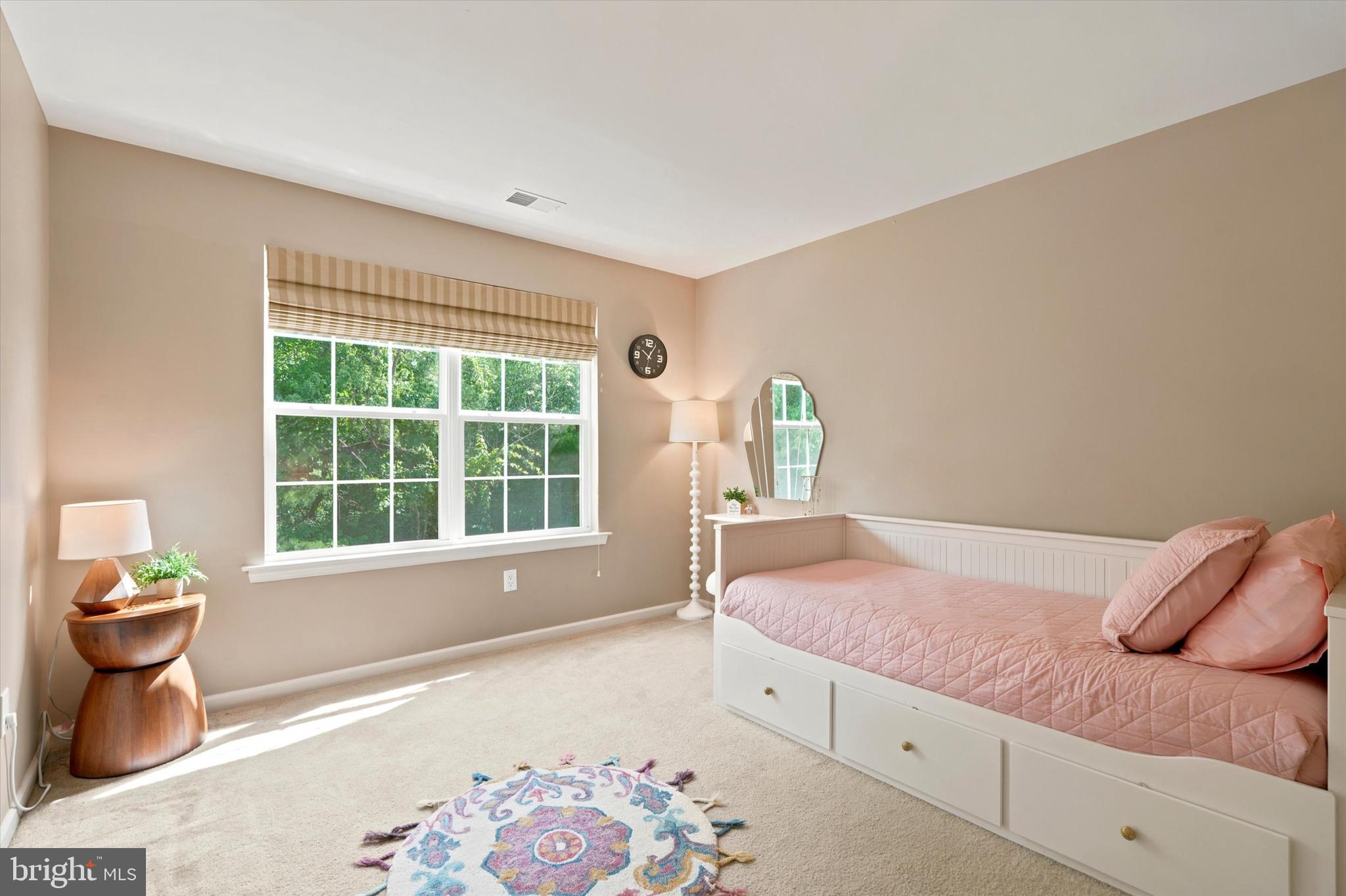 215 Flagstone Road, Unit 1 Chester Springs, PA 19425 - Photo 15 of 33 a bed room with a bed and a window