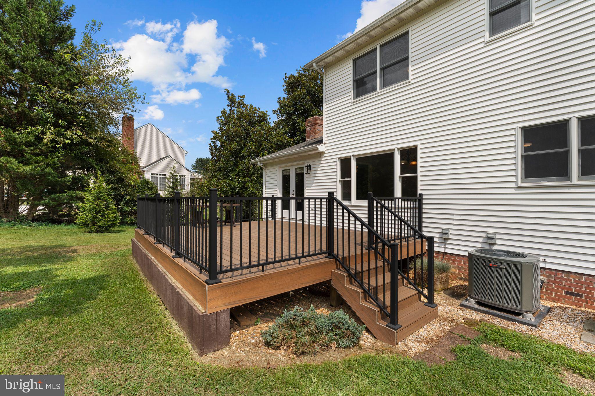 13360 Cameron Court Boston, VA 22713 - Photo 32 of 76 a view of a house with a small yard and wooden fence