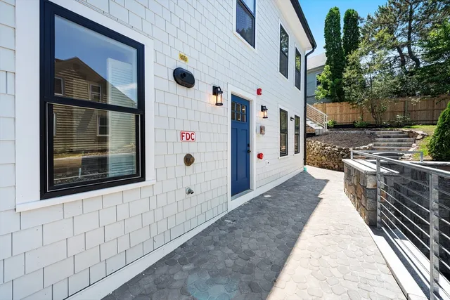 a view of a roof with sitting area
