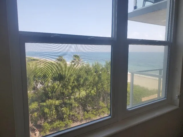 a view of a glass door with a window