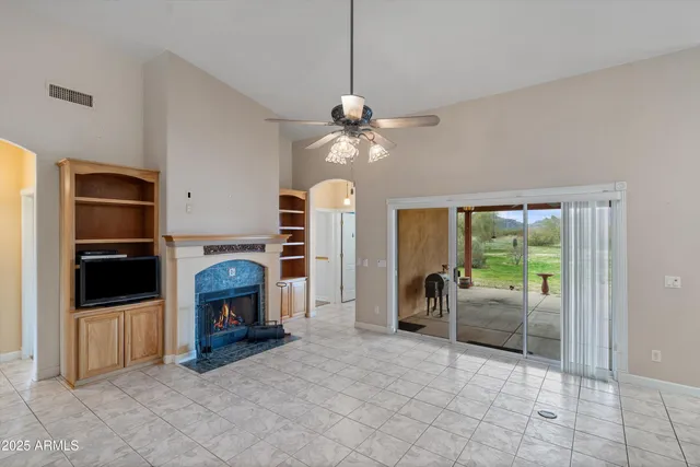 a bathroom with a double vanity sink a mirror and a bathtub