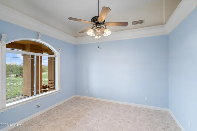 a view of a kitchen with a sink and a refrigerator