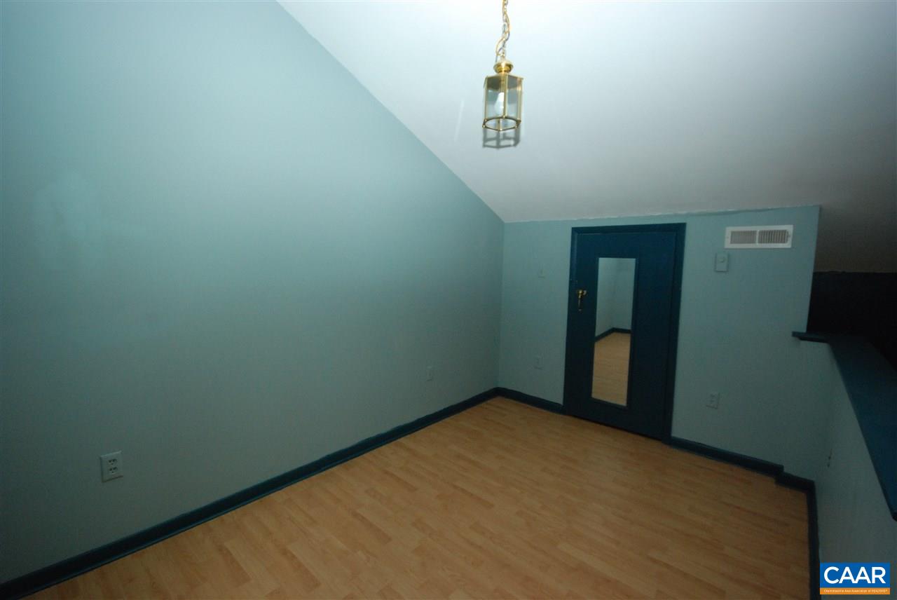 3 Dogleg Road Palmyra, VA 22963 - Photo 15 of 19 a view of a room with rack on the wall