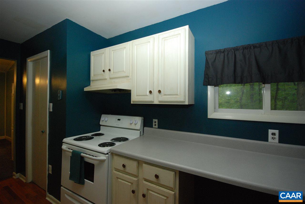 3 Dogleg Road Palmyra, VA 22963 - Photo 5 of 19 a kitchen with a sink a stove and cabinets