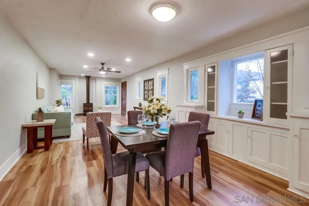 11461 Posthill Place Lakeside, CA 92040 - Photo 13 of 46 a view of a dining room with furniture window and wooden floor