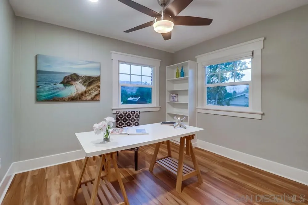 11461 Posthill Place Lakeside, CA 92040 - Photo 19 of 46 a view of a dining room with furniture window and wooden floor
