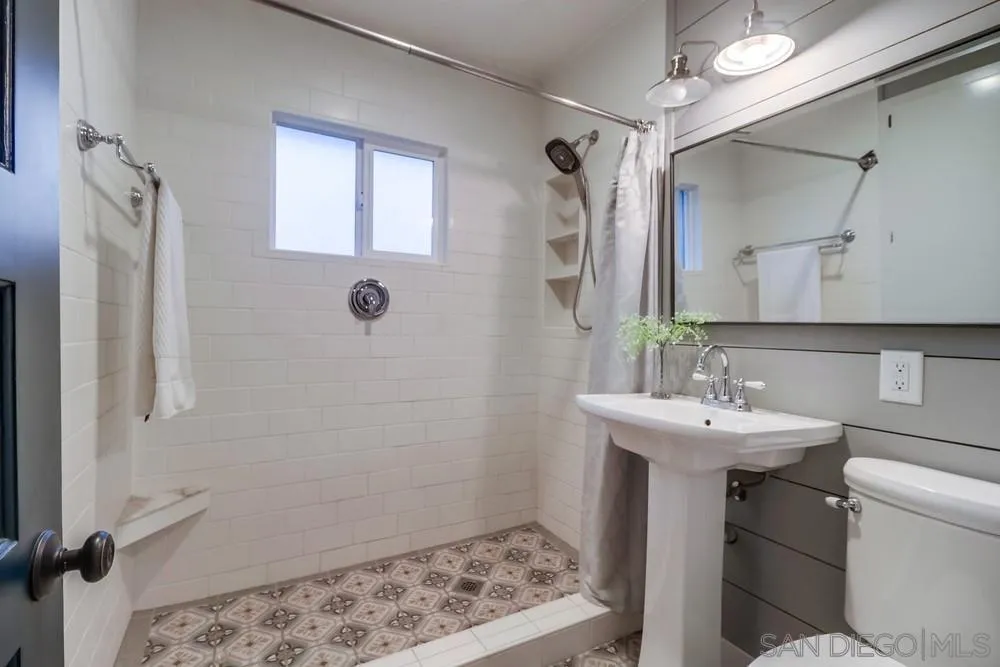 11461 Posthill Place Lakeside, CA 92040 - Photo 21 of 46 a bathroom with a sink toilet and shower