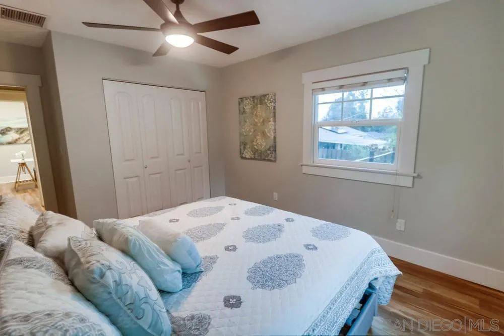 11461 Posthill Place Lakeside, CA 92040 - Photo 26 of 46 a bedroom with a bed and a window