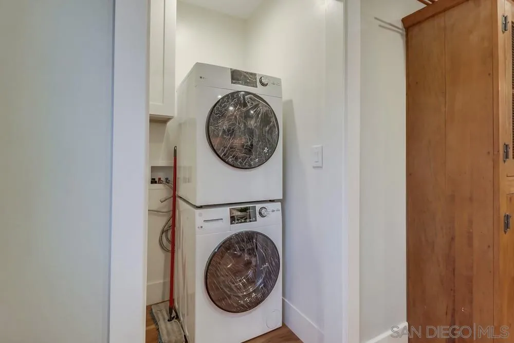 11461 Posthill Place Lakeside, CA 92040 - Photo 28 of 46 a utility room with dryer and washer
