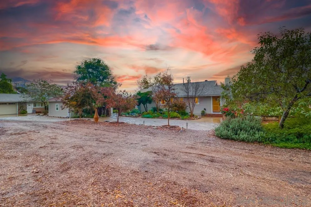 11461 Posthill Place Lakeside, CA 92040 - Photo 3 of 46 a view of a house with a yard and large trees