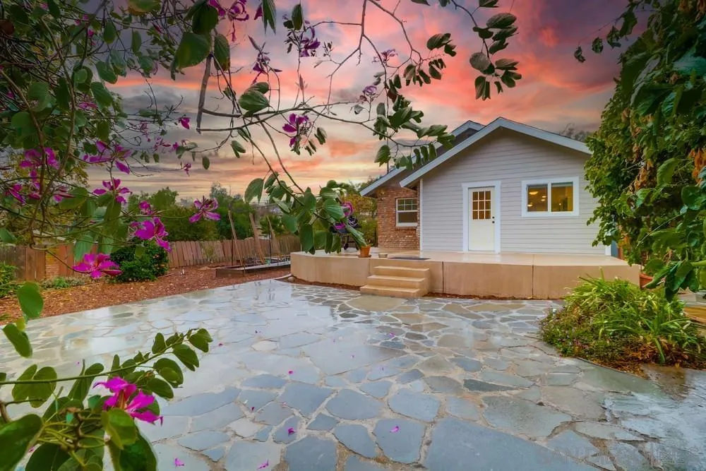 11461 Posthill Place Lakeside, CA 92040 - Photo 37 of 46 a view of a house with a yard and potted plants