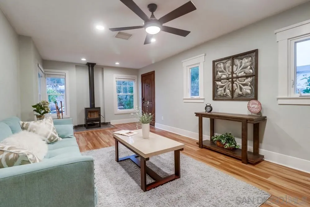 11461 Posthill Place Lakeside, CA 92040 - Photo 6 of 46 a living room with furniture and a fireplace