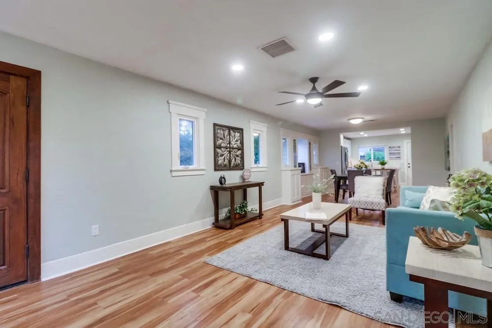 11461 Posthill Place Lakeside, CA 92040 - Photo 9 of 46 a living room with furniture and a wooden floor