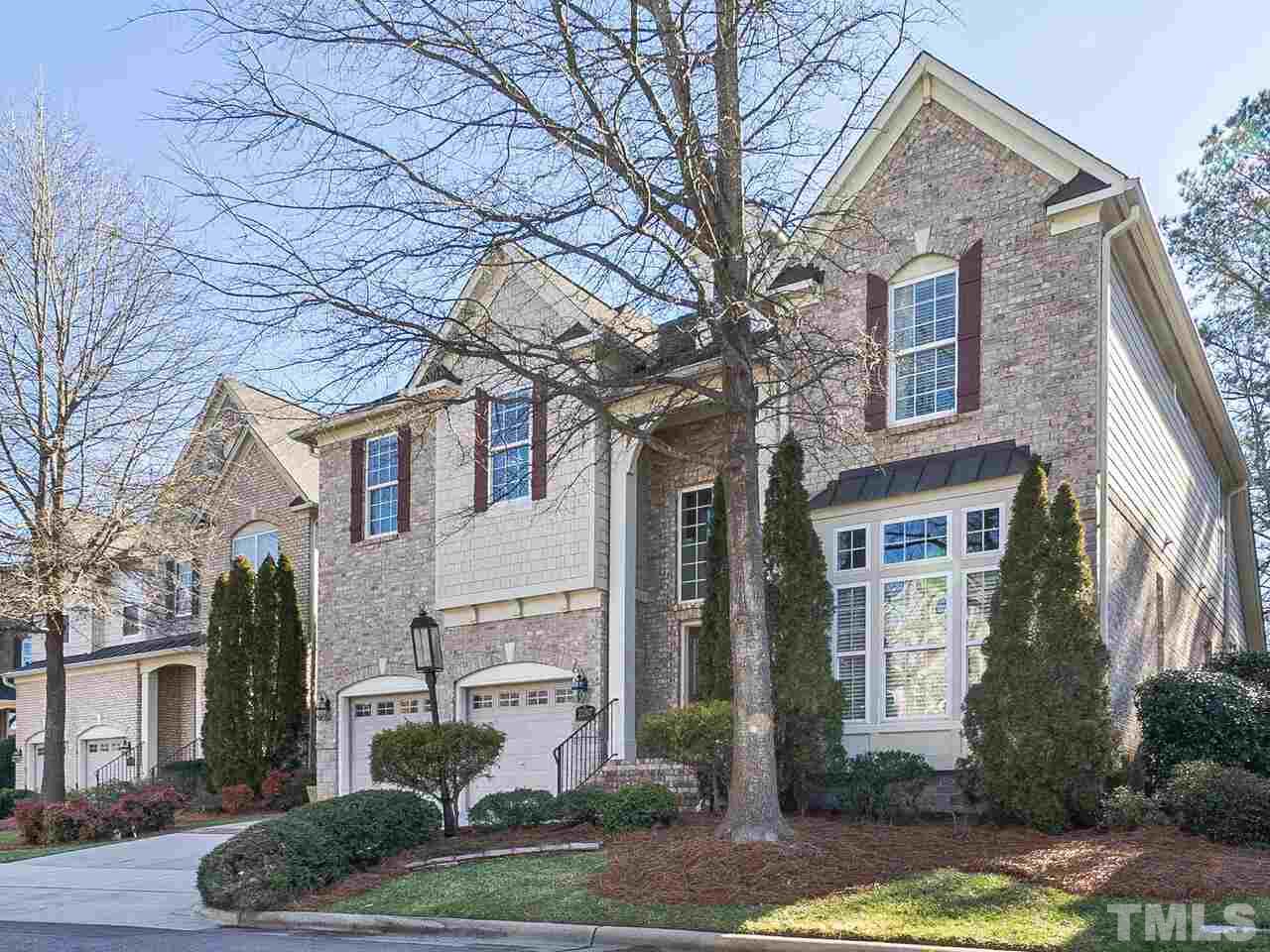 2267 Clayette Court Raleigh, NC 27612 - Photo 1 of 29 a front view of a house with garden