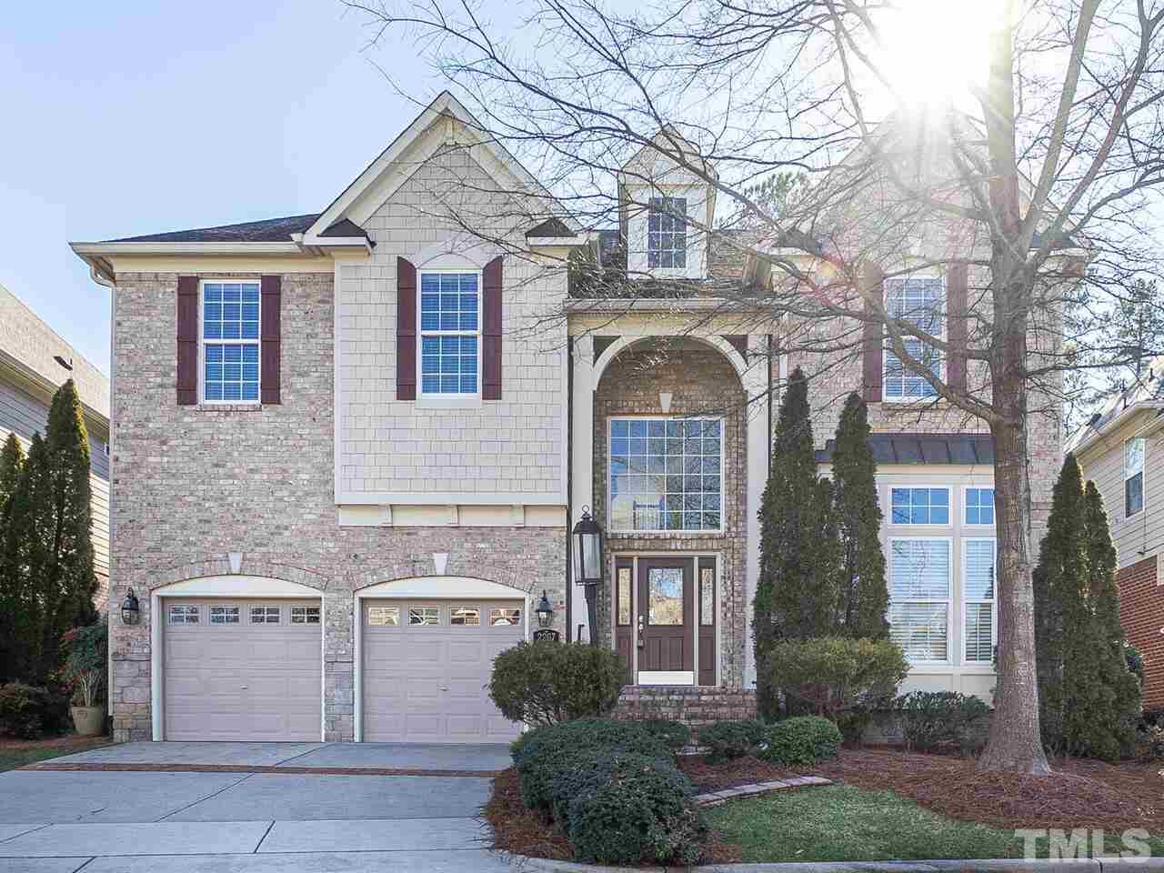 2267 Clayette Court Raleigh, NC 27612 - Photo 2 of 29 a front view of a house with a garden