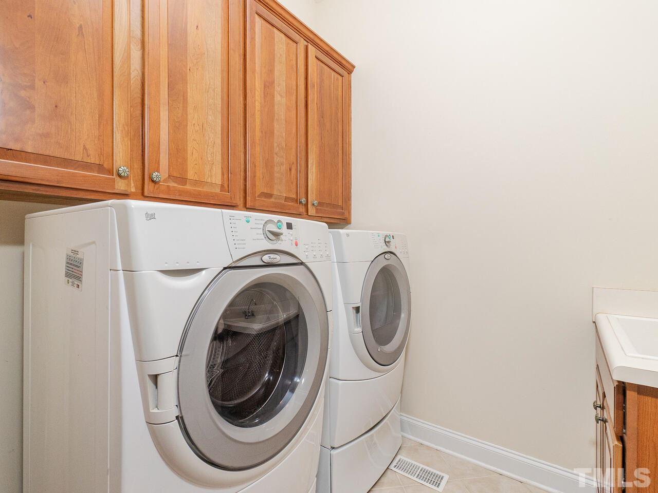 2267 Clayette Court Raleigh, NC 27612 - Photo 17 of 29 a utility room with dryer and washer