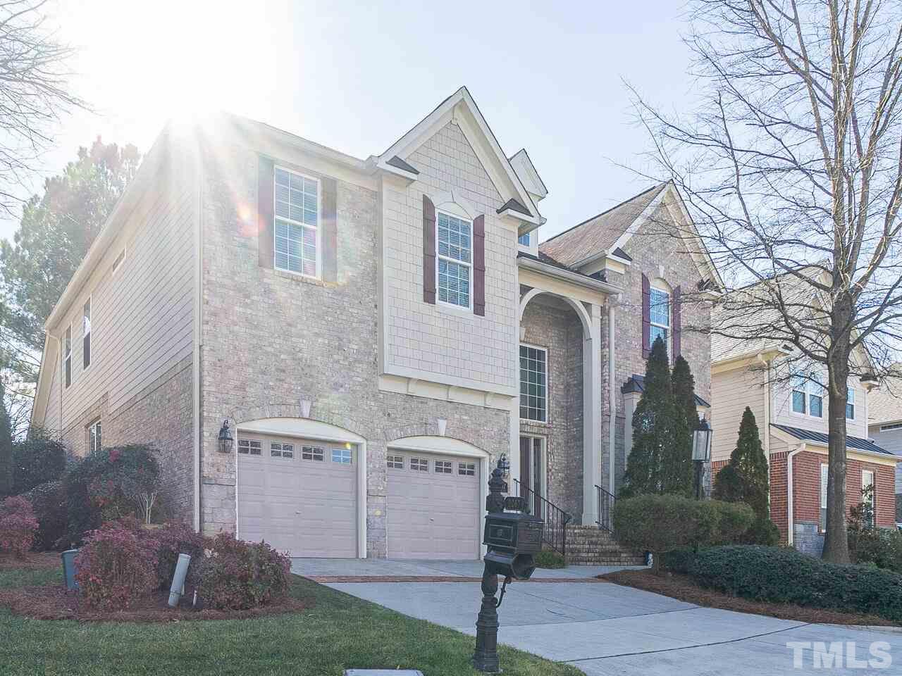 2267 Clayette Court Raleigh, NC 27612 - Photo 3 of 29 a front view of a house with garden