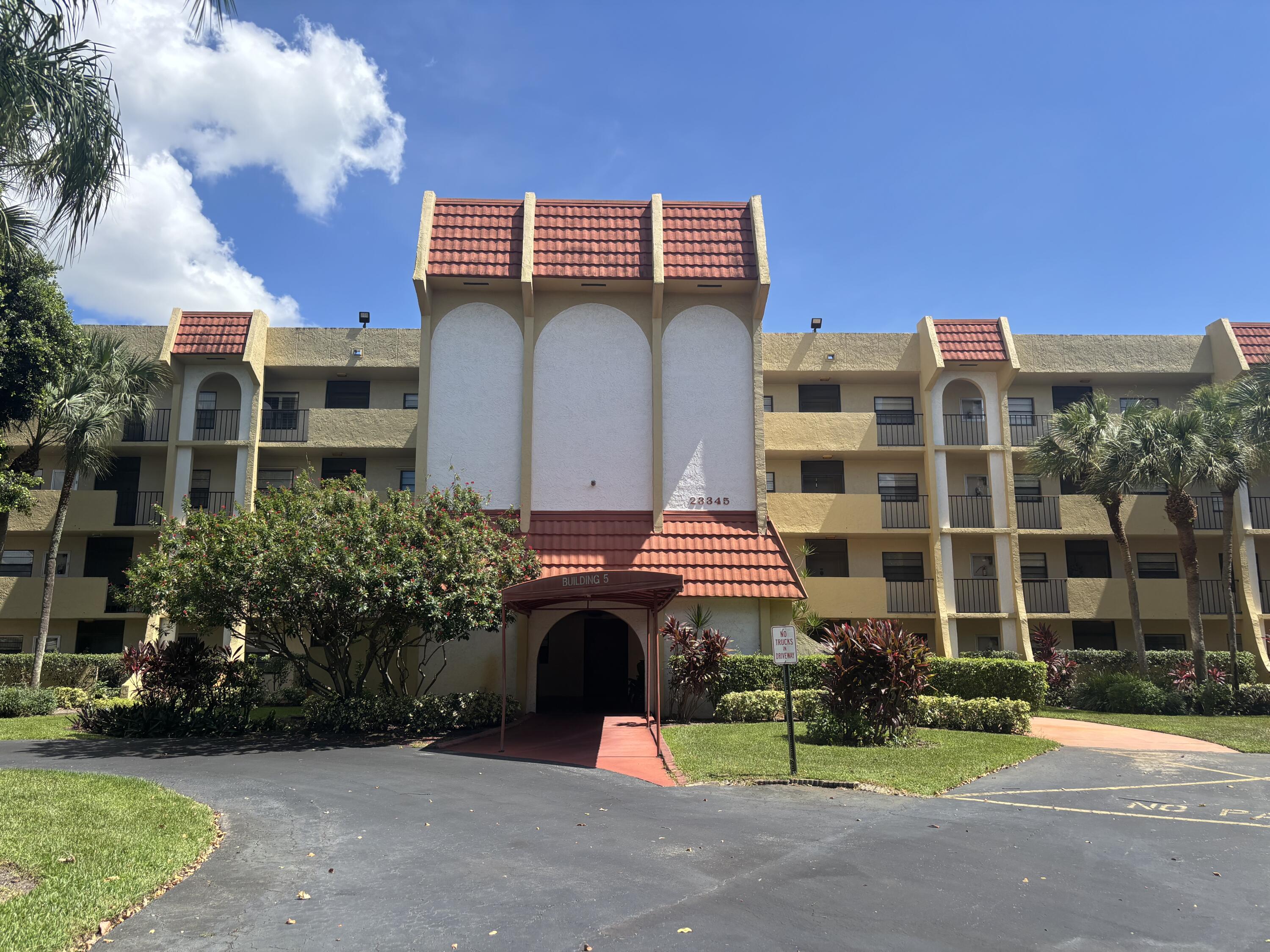 23345 Carolwood Lane, Unit 101 Boca Raton, FL 33428 - Photo 1 of 31 Front