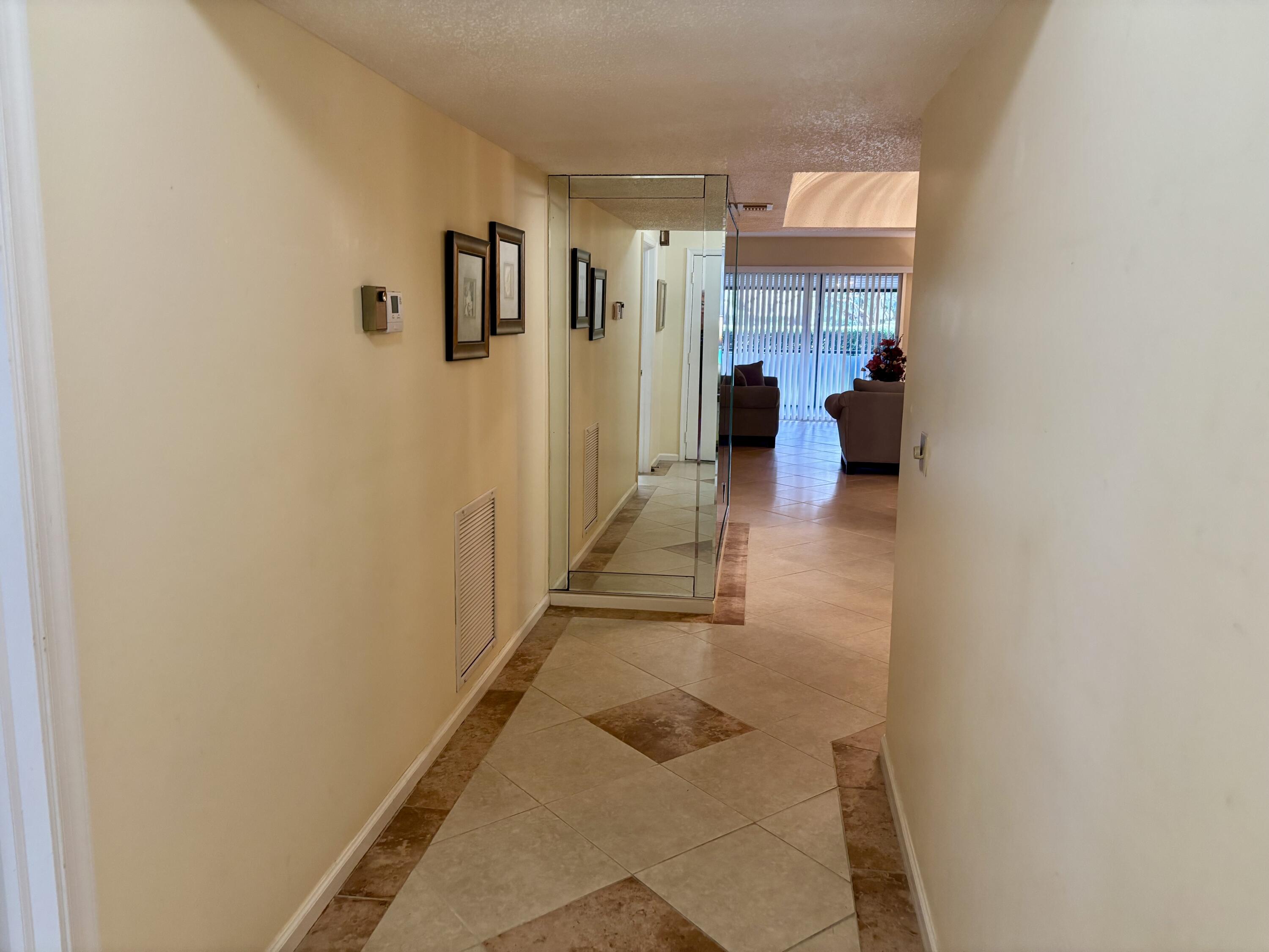 23345 Carolwood Lane, Unit 101 Boca Raton, FL 33428 - Photo 4 of 31 IMG_4539