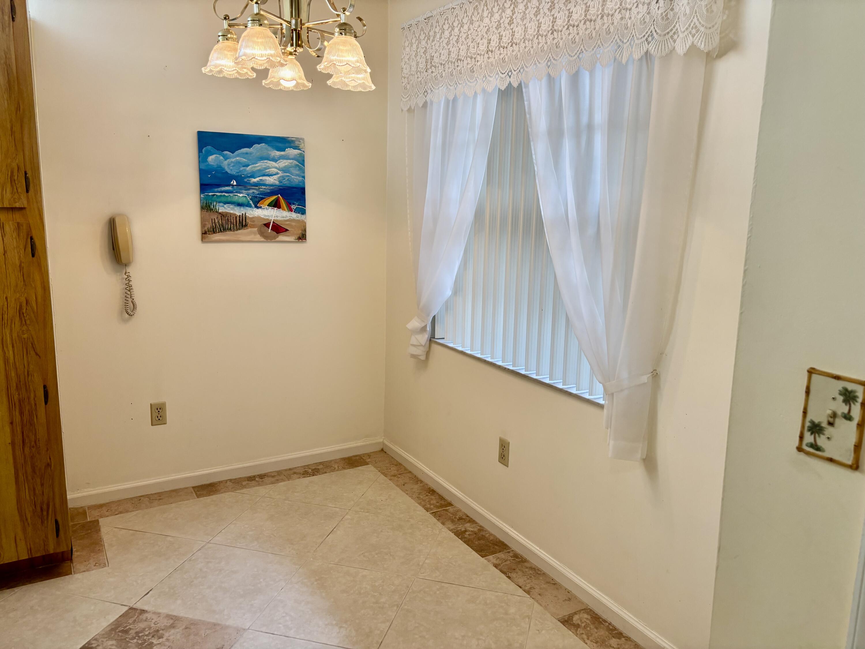 23345 Carolwood Lane, Unit 101 Boca Raton, FL 33428 - Photo 5 of 31 IMG_4540