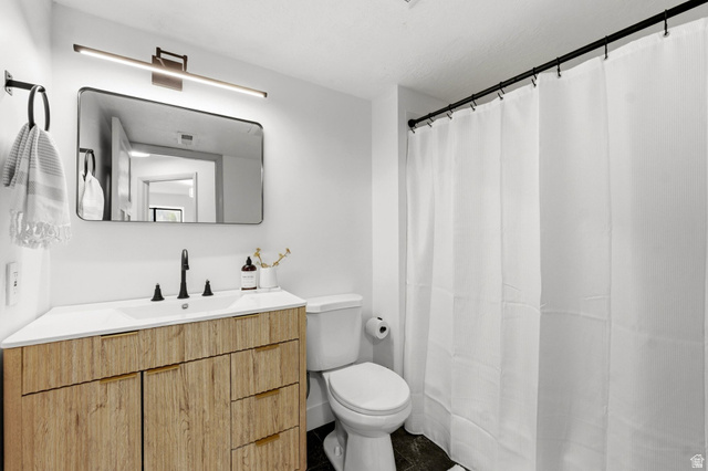 1175 Canyon Road, Unit 77 Ogden, UT 84404 - Photo 6 of 16 Bathroom with vanity and a shower