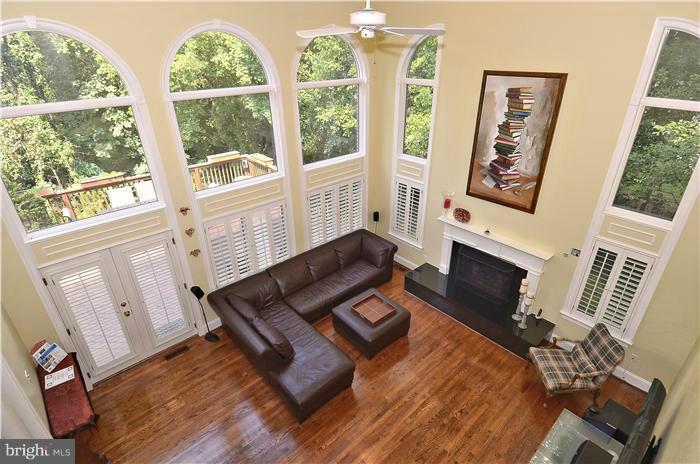 7735 Greentree Road Bethesda, MD 20817 - Photo 9 of 30 Family Room with 2nd Fire Place