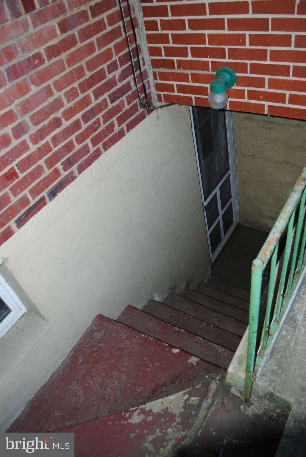 137 Riverthorn Road Baltimore, MD 21220 - Photo 23 of 30 COVERED ENTRANCE TO BASEMENT