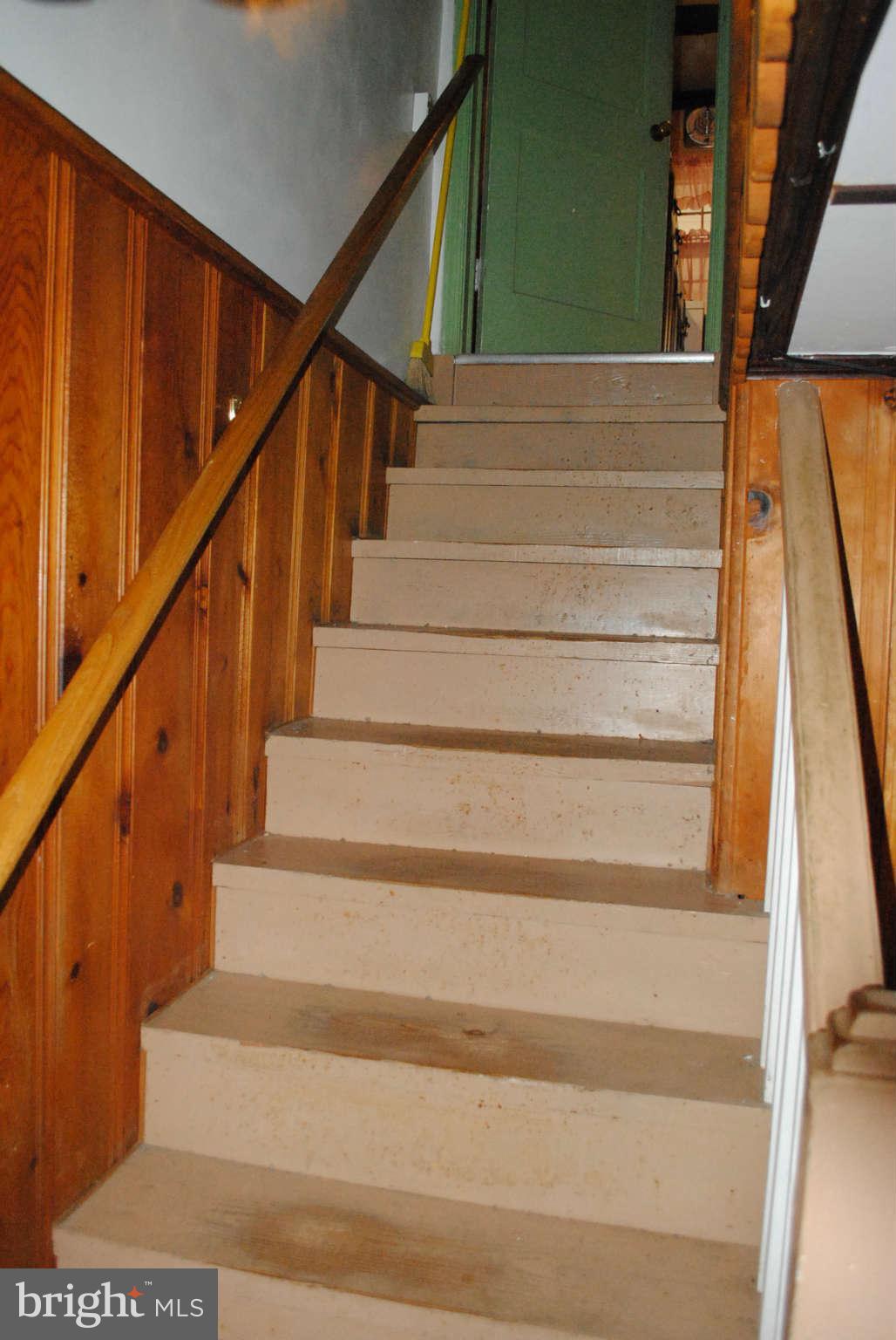 137 Riverthorn Road Baltimore, MD 21220 - Photo 24 of 30 STAIRCASE FROM BASEMENT TO MAIN LEVEL