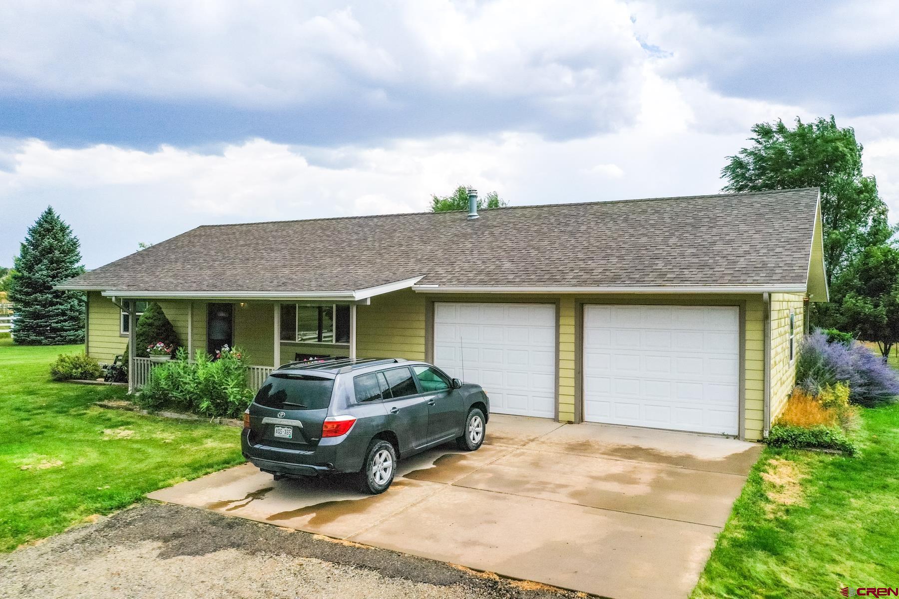 25548 Rd N 6 Loop Cortez, CO 81321 - Photo 1 of 35 a house view with a garden space