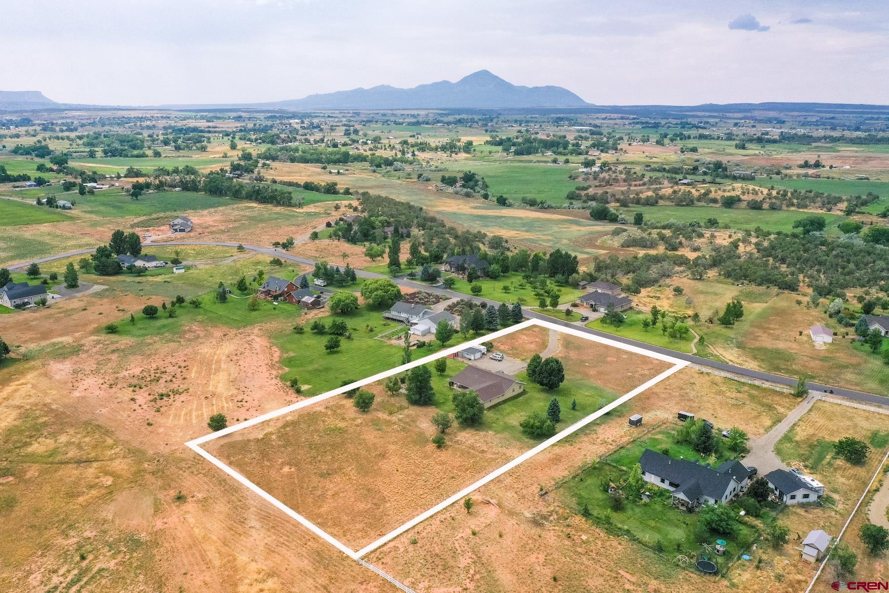 25548 Rd N 6 Loop Cortez, CO 81321 - Photo 3 of 35 an aerial view of residential houses with outdoor space and river