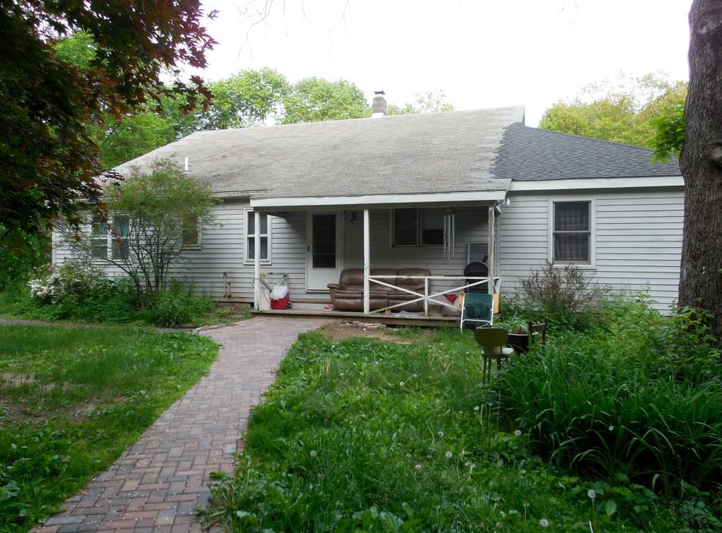 272 West Morris Road Morris, CT 06763 - Photo 1 of 1 a front view of house with yard and green space
