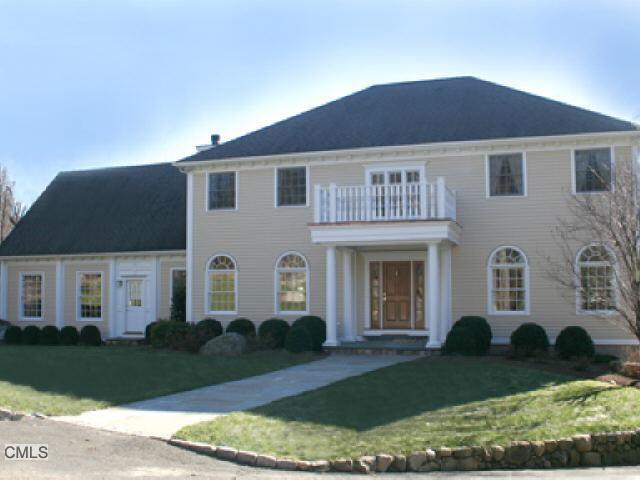 126 Mayapple Road Stamford, CT 06903 - Photo 1 of 1 a front view of a house with a yard