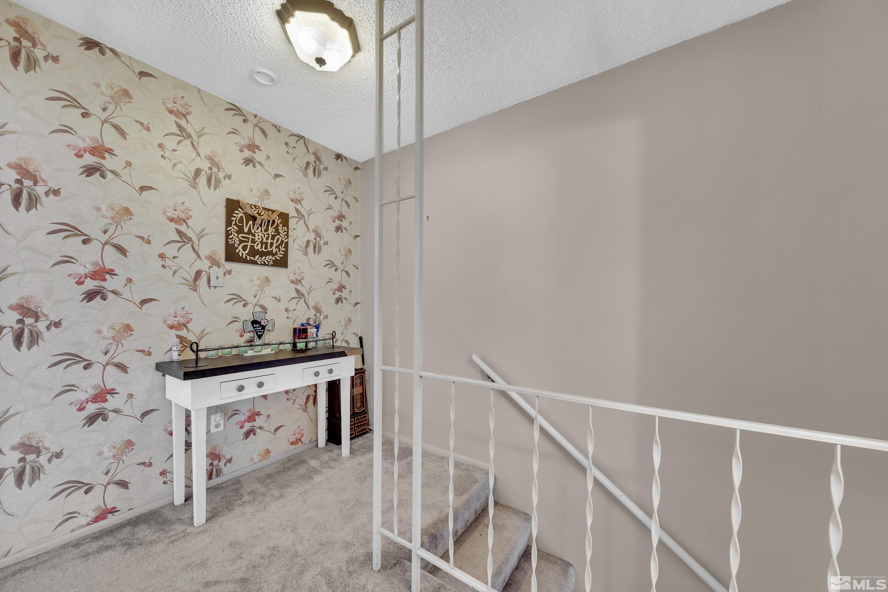 335 Smithridge Park Reno, NV 89502 - Photo 20 of 30 a kitchen with granite countertop a sink and a stove