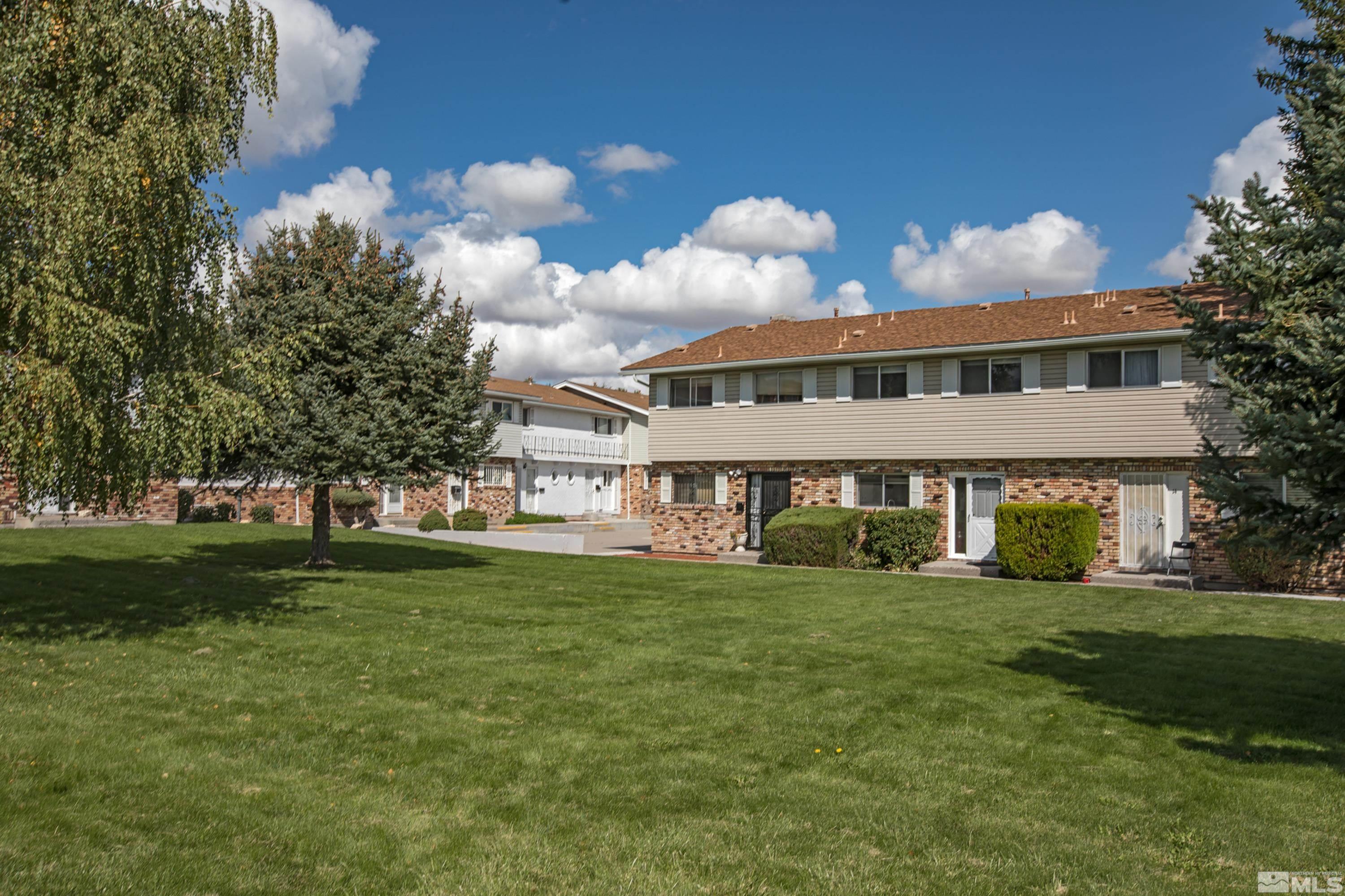335 Smithridge Park Reno, NV 89502 - Photo 26 of 30 a view of a house with a yard