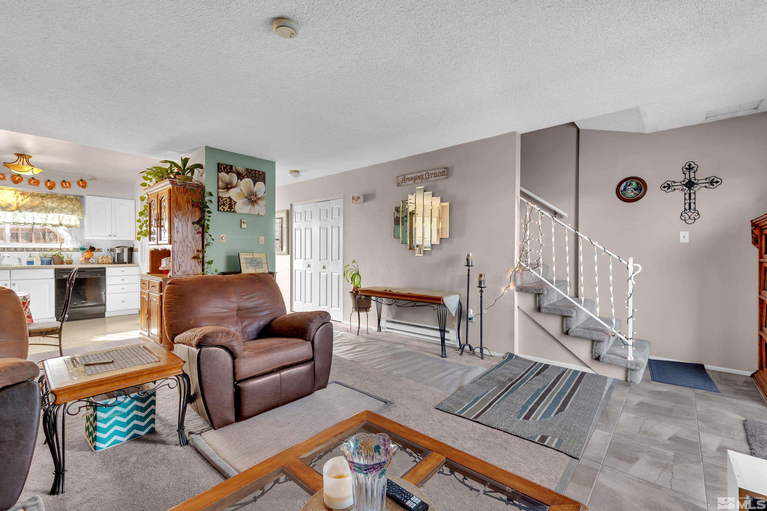 335 Smithridge Park Reno, NV 89502 - Photo 5 of 30 a living room with furniture and wooden floor