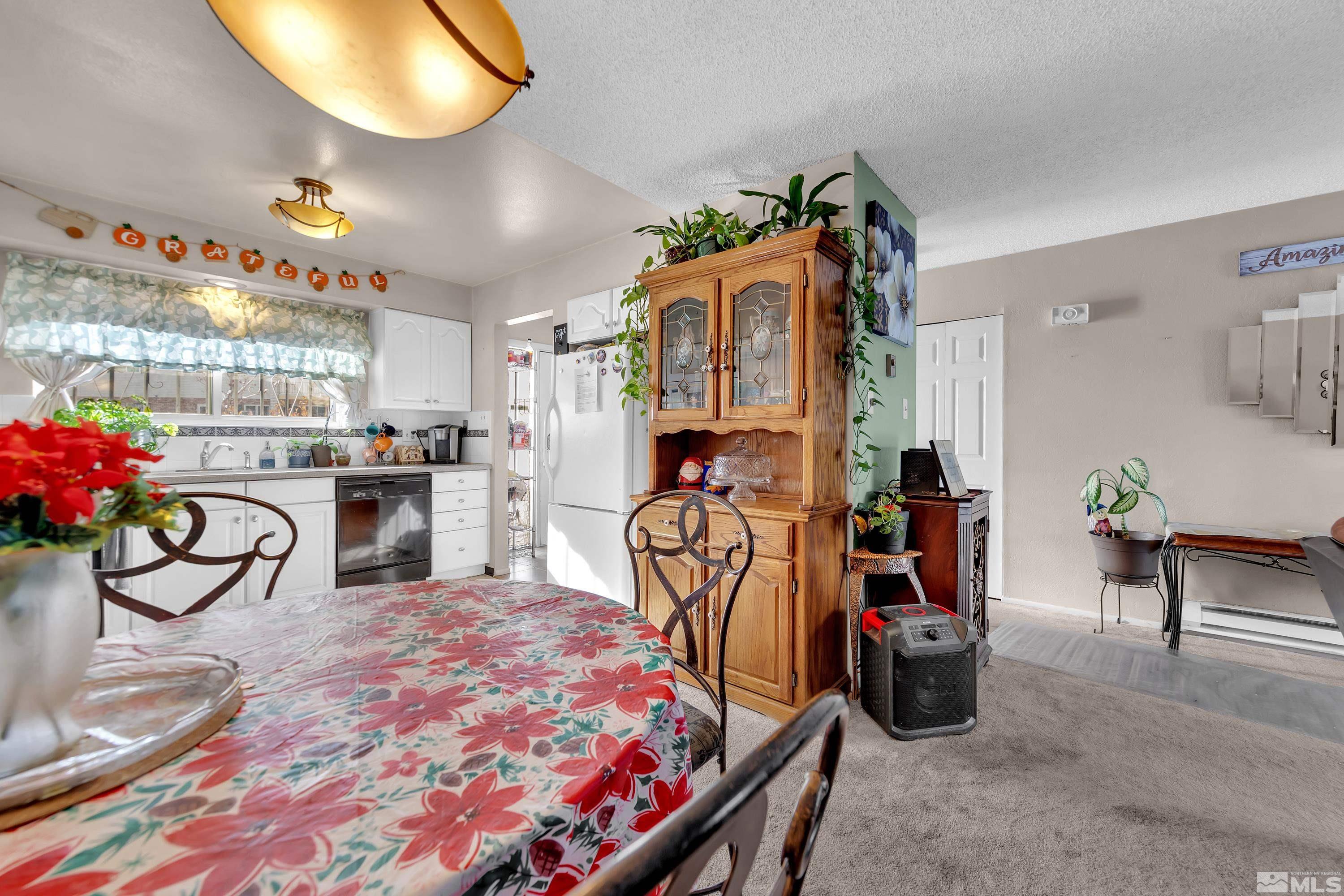 335 Smithridge Park Reno, NV 89502 - Photo 8 of 30 a bedroom with furniture and a bed