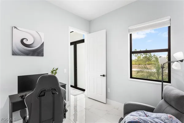 a view of workspace with lounge chair