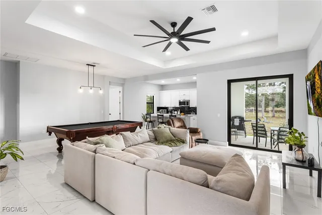 a living room with furniture and a table