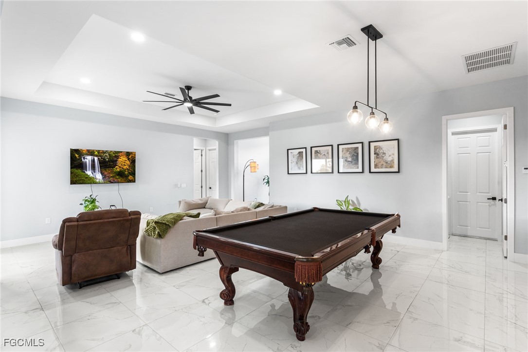 7583 15th Place LaBelle, FL 33935 - Photo 17 of 34 a living room with furniture and a table