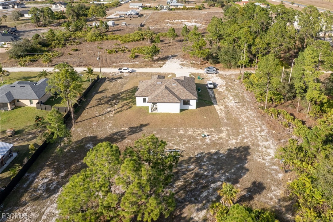 7583 15th Place LaBelle, FL 33935 - Photo 8 of 34 a view of a pathway with a yard