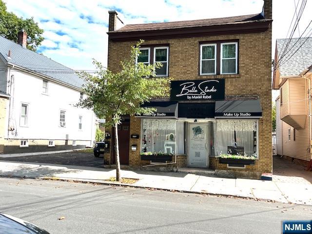 a front view of a building with street