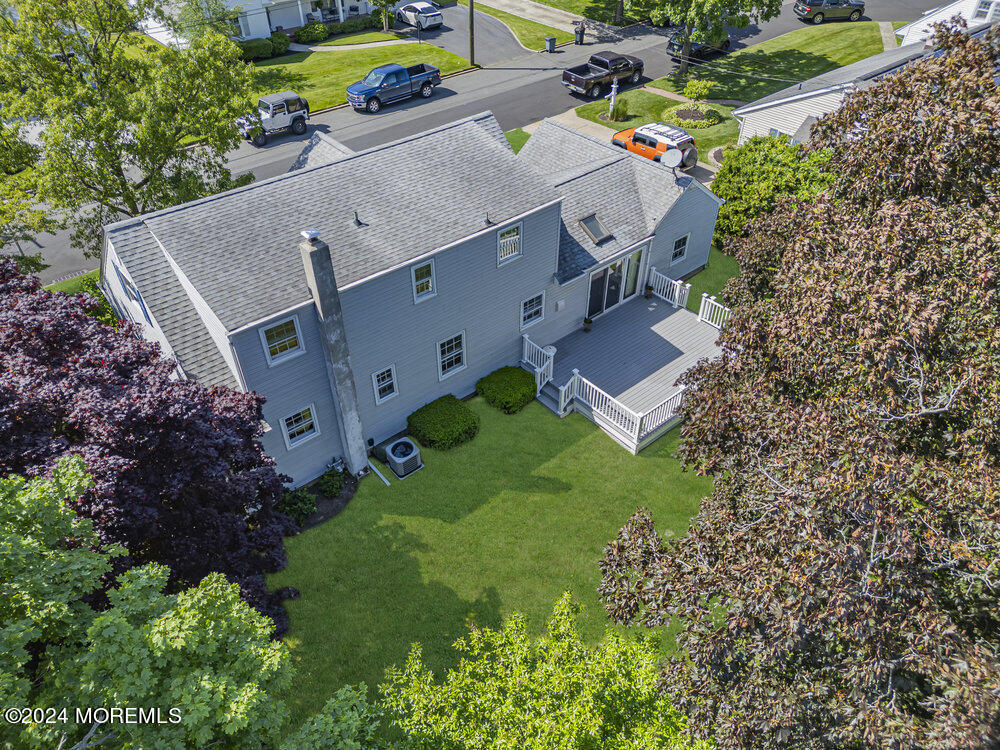 4 Cherry Place Manasquan, NJ 08736 - Photo 12 of 46 an aerial view of a house with a garden