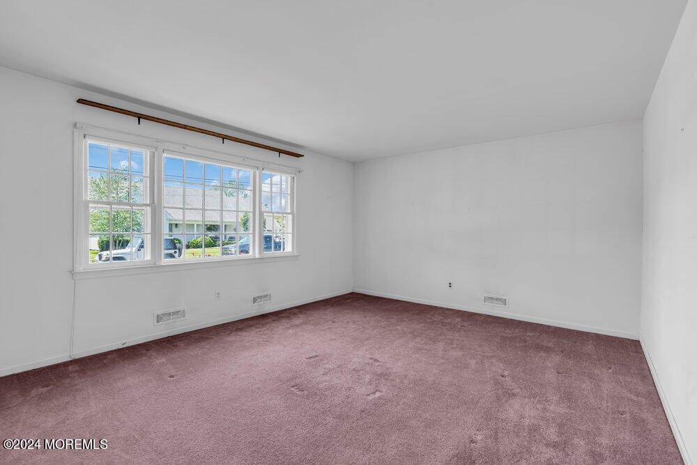 4 Cherry Place Manasquan, NJ 08736 - Photo 13 of 46 an empty room with a window