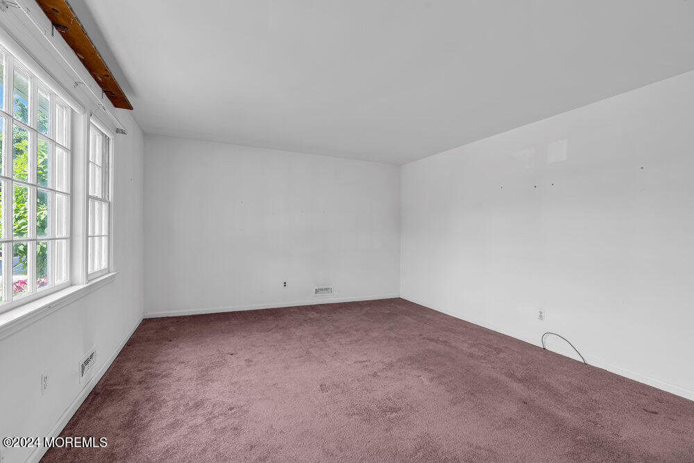 4 Cherry Place Manasquan, NJ 08736 - Photo 14 of 46 an empty room with a window
